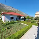 Flowery House Near The Sea And The Mountain